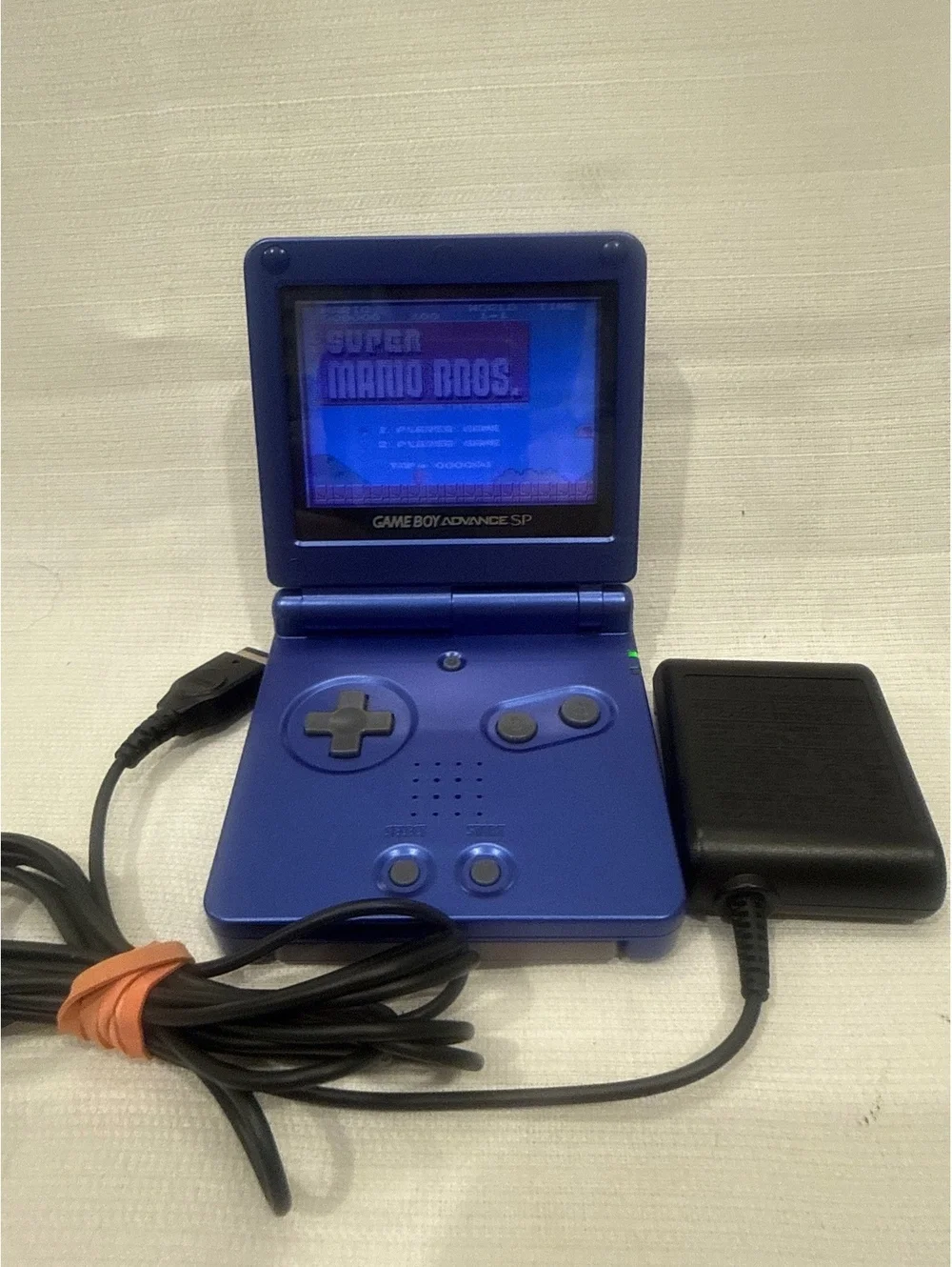 Cobalt Nintendo Game Boy Advance SP Handheld with OEM Charger and 9 Games Tested